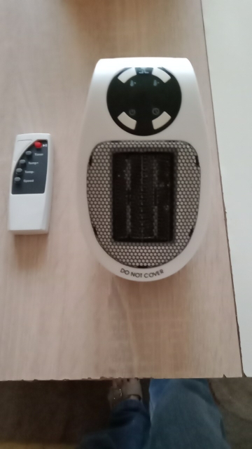 Portable Electric Fan Heater with Adjustable Thermostat photo review