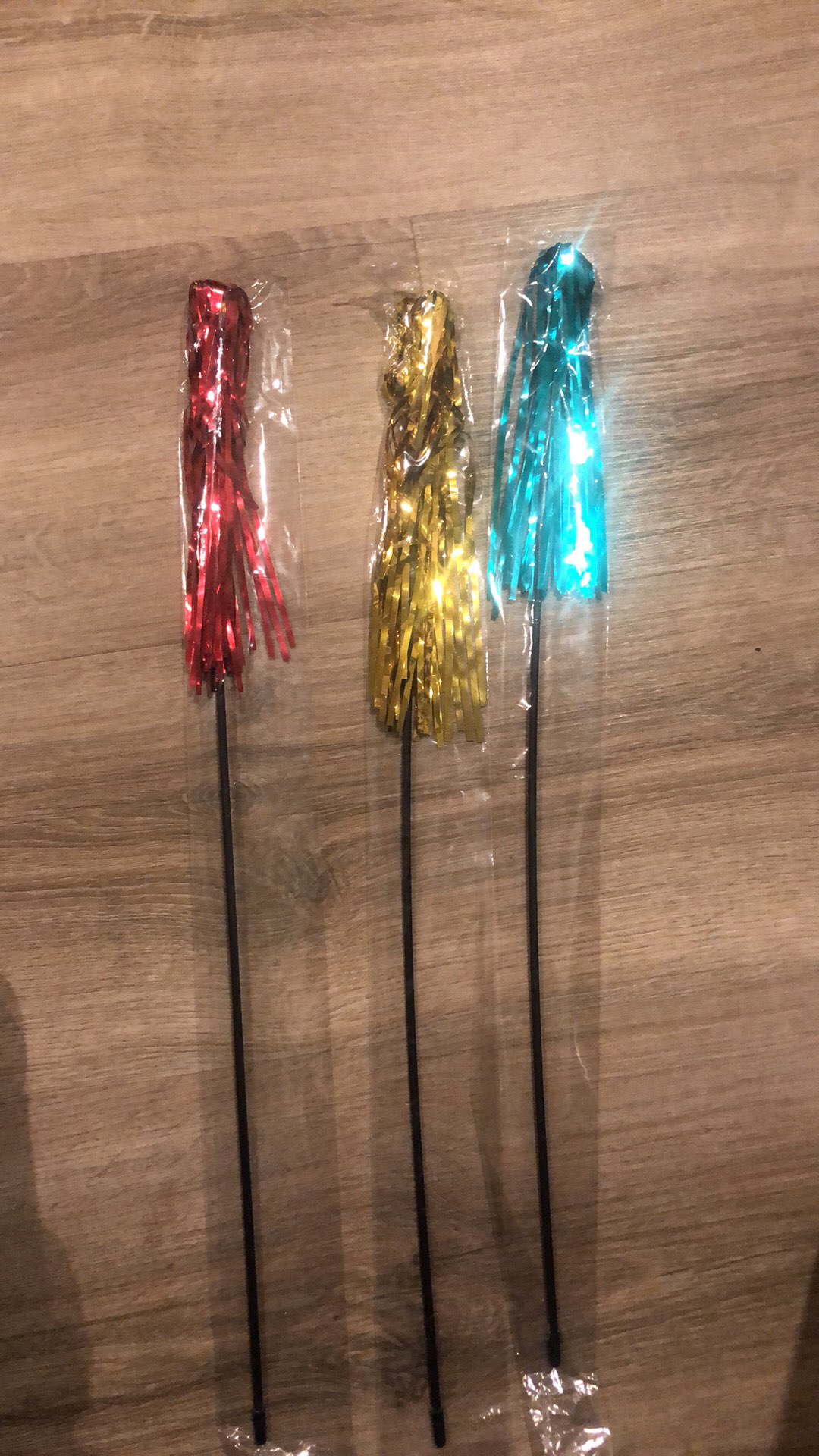 Colorful Sparkly Fishing Rod Cat Toy photo review