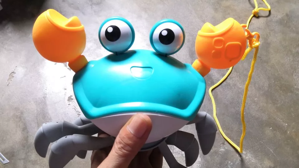 Infrared Sensor Crab Toy with Lights and Music photo review