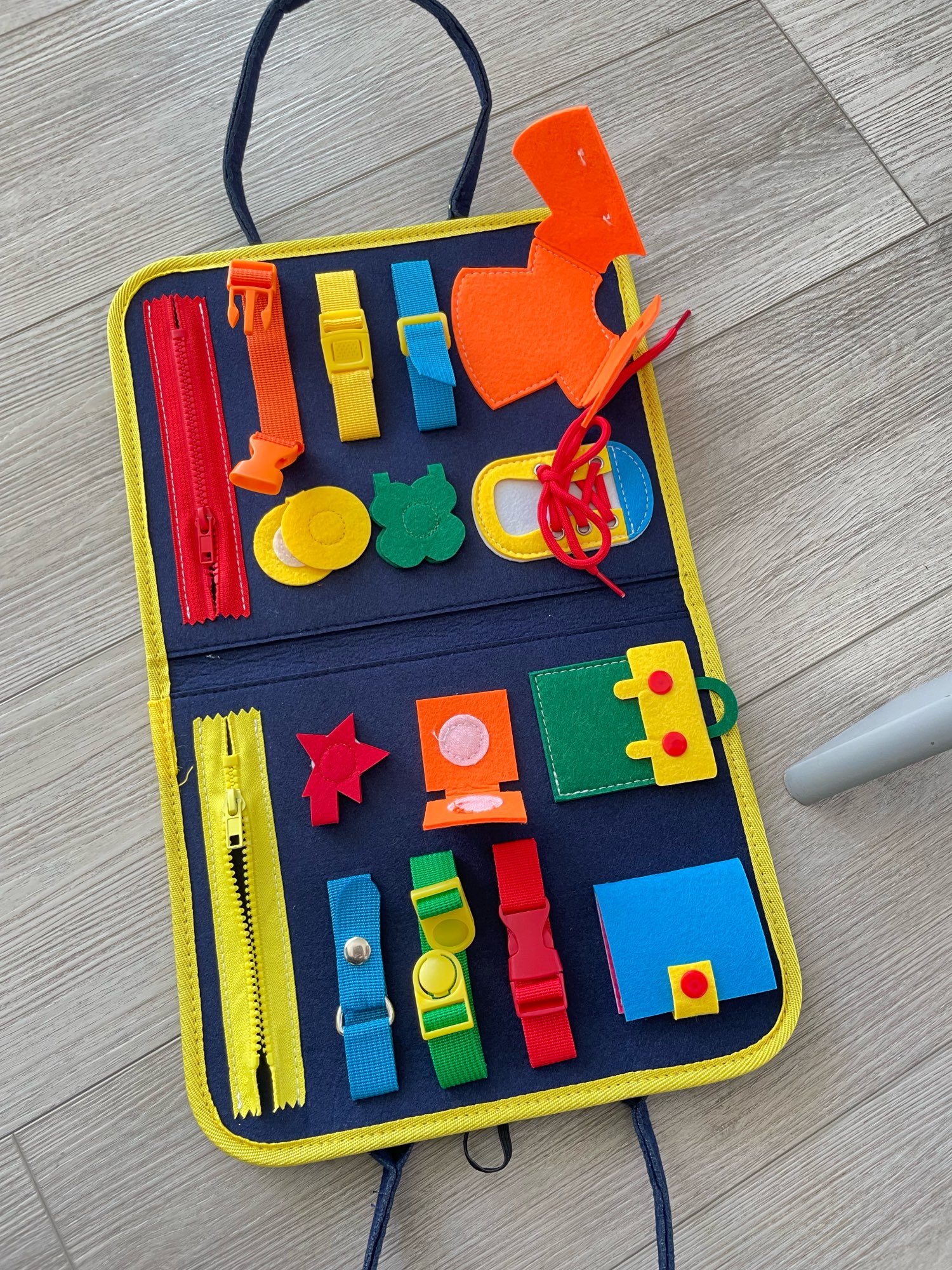 Busy Board in the Shape of a Toy Bag for Babies photo review