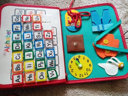 Busy Board in the Shape of a Toy Bag for Babies photo review