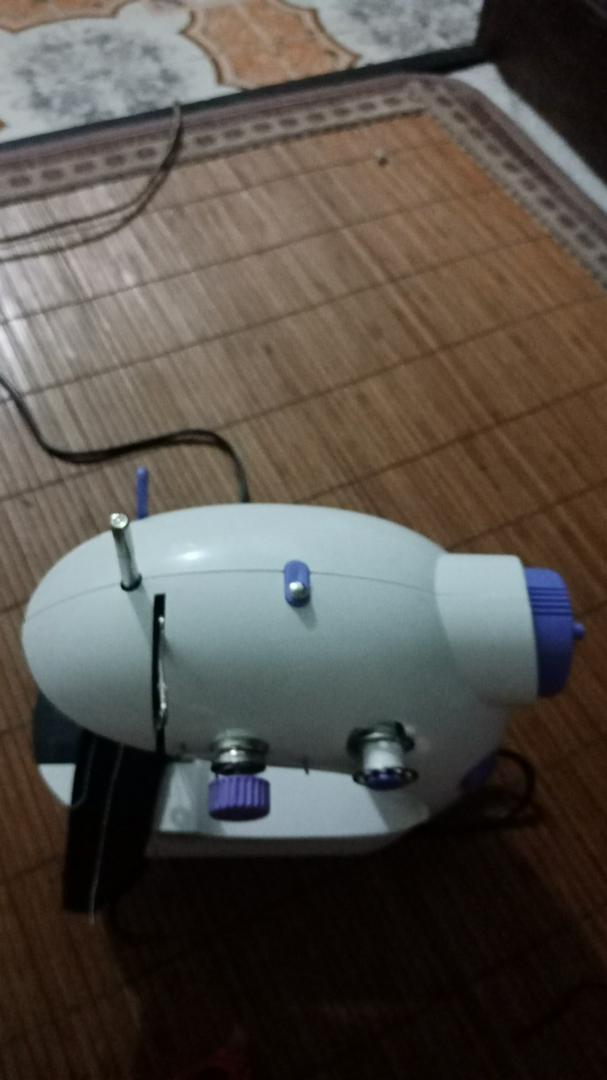 Mini Sewing Machine, Home Mini Electric Small Handheld Desktop Sewing Machine photo review