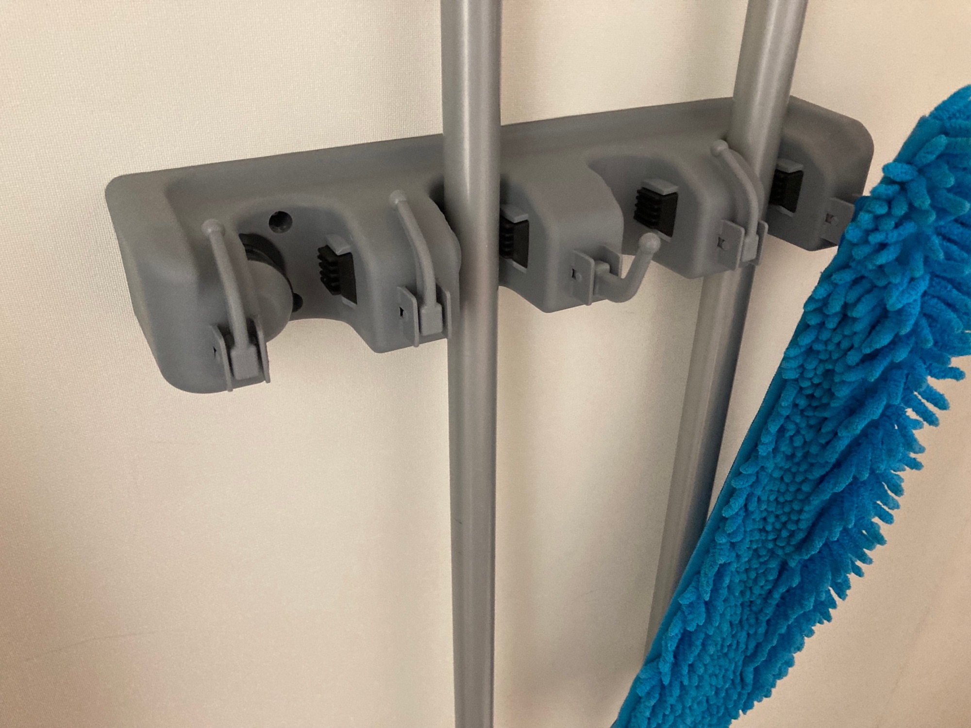 Wall-mounted multi-functional mop and broom holder photo review